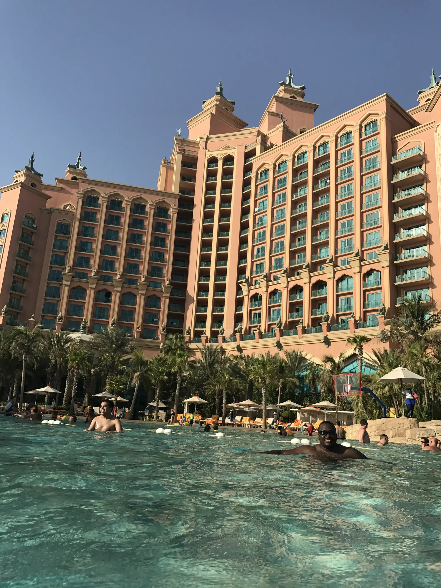 Atlantis The Palm towering over its lagoon pool in Dubai